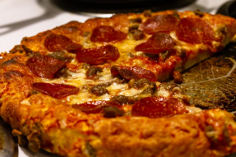 Pequod's pizza signature caramelized crust deep dish pizza
