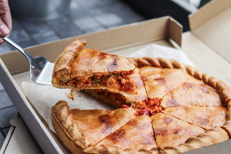 Pequod's pizza pepperoni deep dish